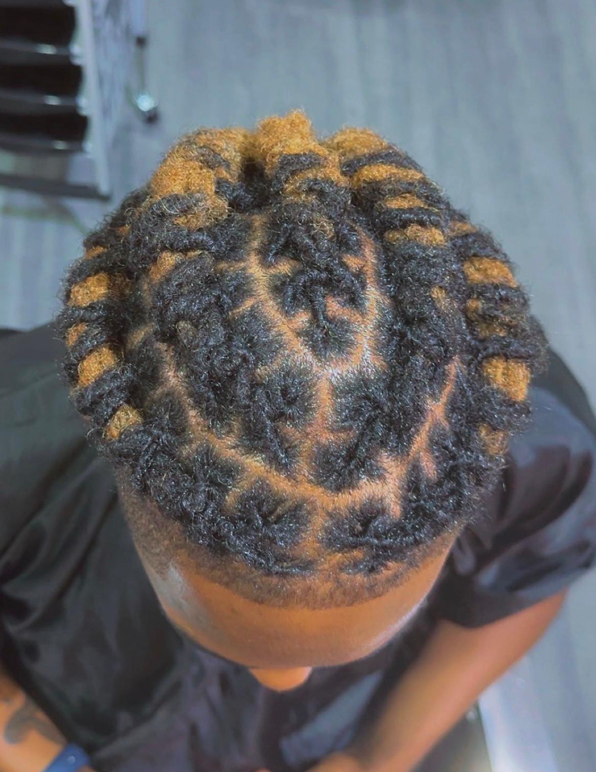 Réalisation tressage — cornrows en chignon
